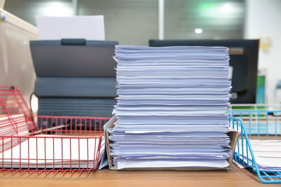stack of papers on the desk