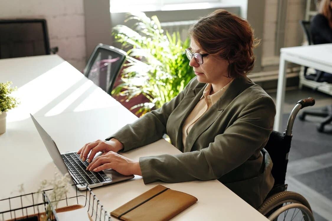 a lady using laptop