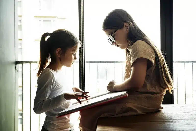Two Girls Learning Together