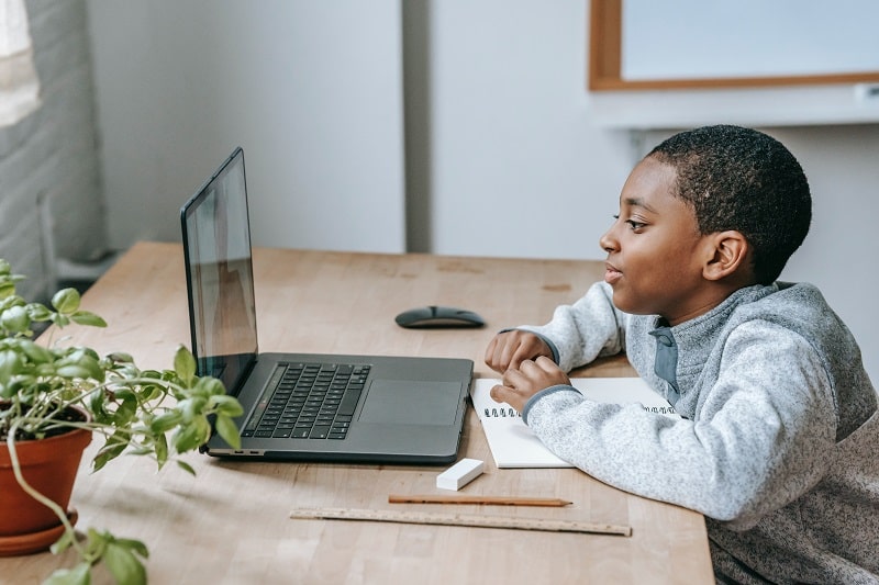 Black boy Using laptop