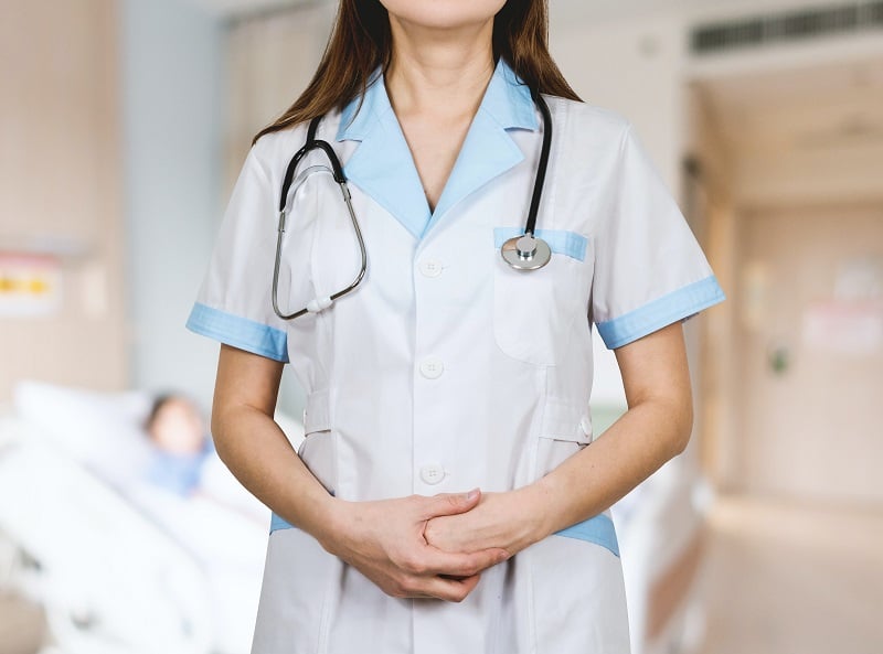 Doctor woman with white coat and stethoscope